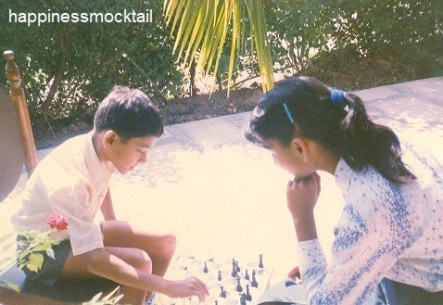 Brother-Sister Playing Chess